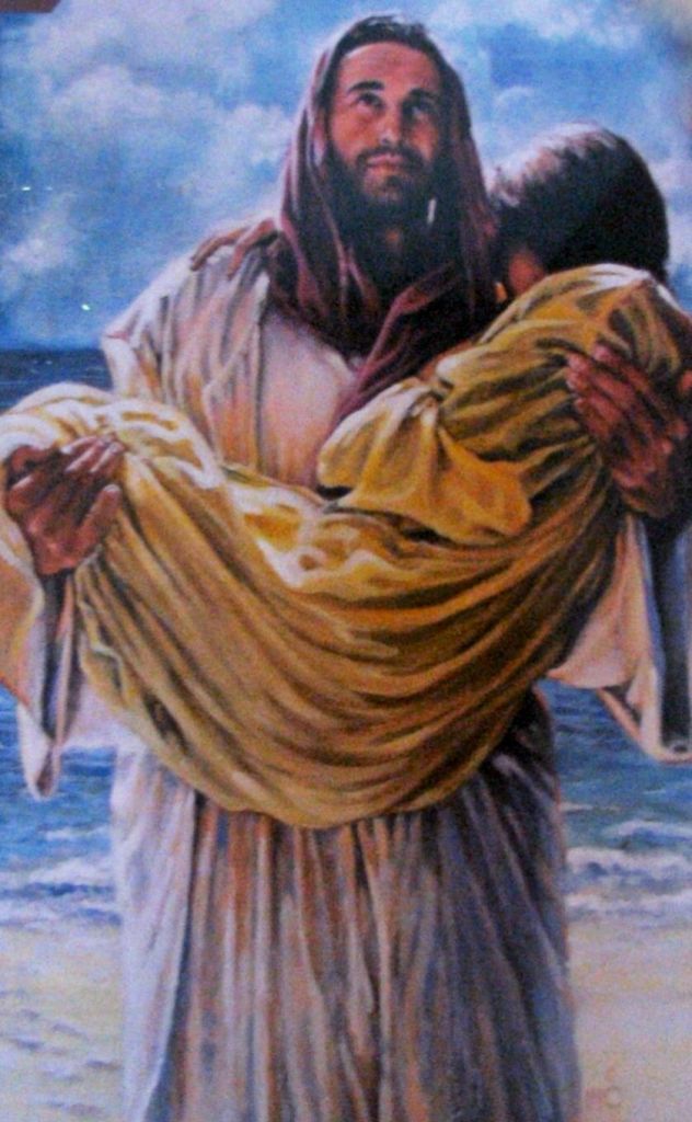 Footprints. Christ carrying us in troubled times.